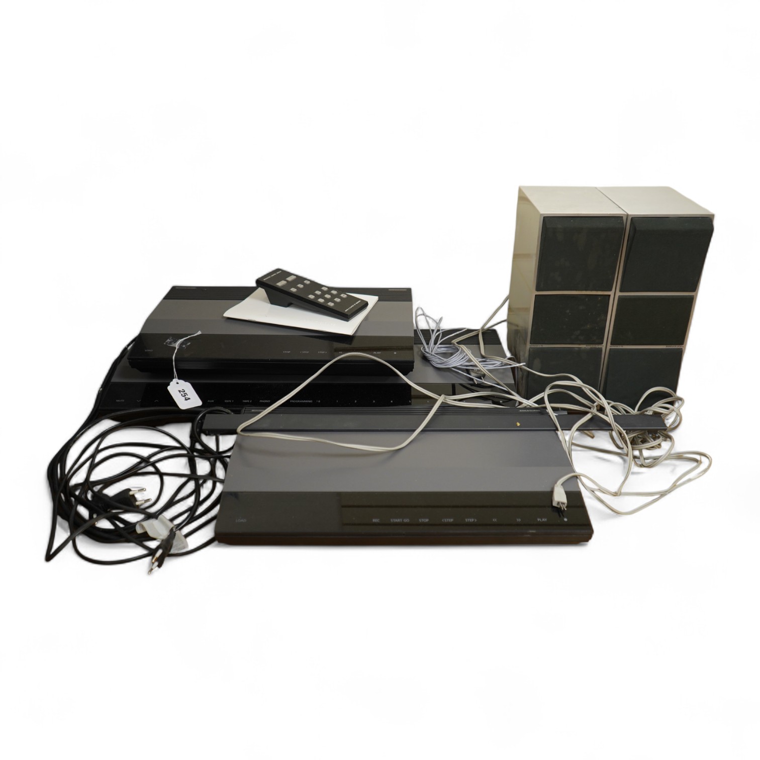 A 1980s Bang & Olufsen Beosystem 3500 stereo system, comprising; a Beocord 3500, a Beogram CD 3500, a Beomaster 3500, a pair of Beovox C75 stereo speakers, a Beocenter Control Module and an Owner’s Manual dated 1989.